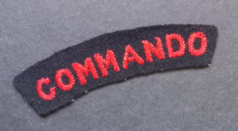 A superb - albeit regrettably single - early embroided Commando shoulder title