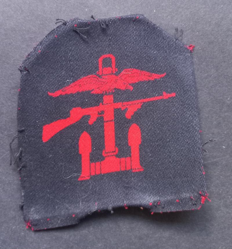 A perfect - right facing - regrettably single printed Combines Operation formation badge