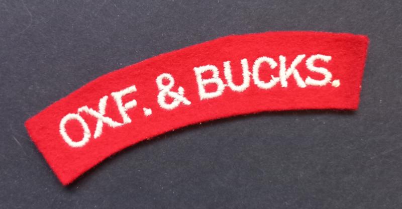 A attractive - albeit regrettably single - un-issued embroided Oxf.& Bucks. (Oxfordshire and Buckinghamshire Light Infantry) shoulder title