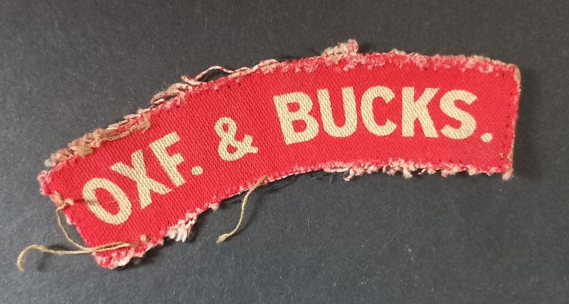 A attractive - albeit regrettably single - issued printed Oxf.& Bucks. (Oxfordshire and Buckinghamshire Light Infantry) shoulder title