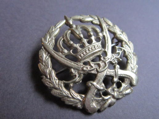 British/local made 'white metal 'sand cast' Arab Legion head-dress badge 