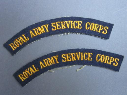 A nice and un-issued set of 'serif' type lettering Royal Army Service Corps shoulder titles