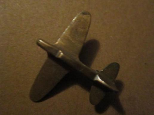 A nice British home made patriotic i.e aid of war Spitfire badge