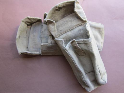 A nice full matching set of British made '37 pattern MkIII issued basic ammunition pouches