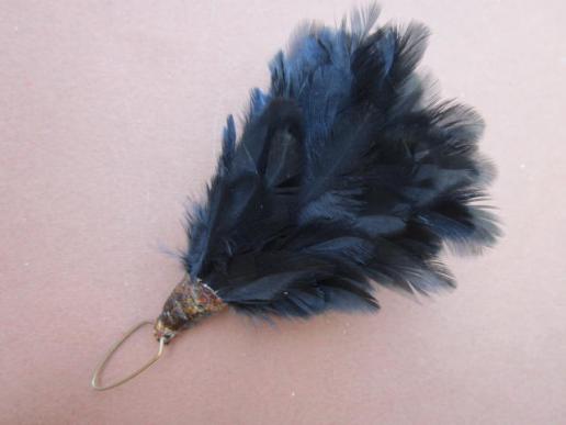 A good example of a '40 period Number 9 Commando black beret hackle 