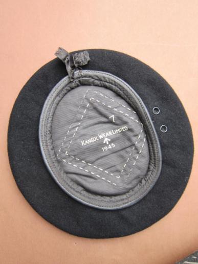 A nice and classic Kangol Wear Limited 1945 dated black beret 