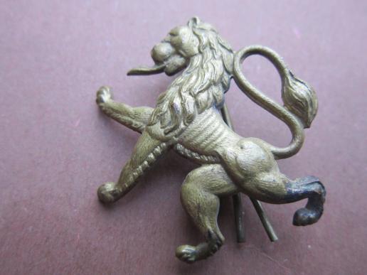 A nice wartime British made Belgium Free Army forces ramping lion beret badge