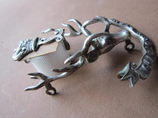 A nice and difficult to find 3D type three piece Sterling Silver Canadian Officers Seaforth Higlanders cap badge 