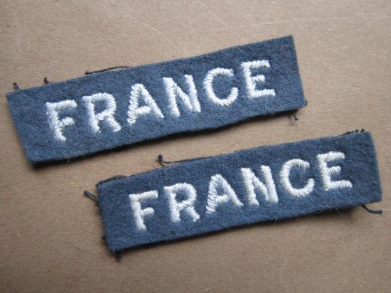 A full matching set of British made RAF (Royal Air Force) FRANCE shoulder titles worn by French volunteer officers