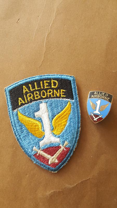 A nice original set of two American made badges to the 1st Allied Airborne Command