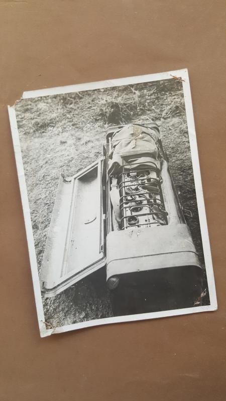 A nice official 'press release' photograph of a F dropping container showing a Number 22 wireless radio set