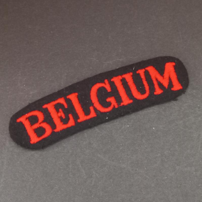 A superb - albeit regrettably single - British made large Belgium shoulder title