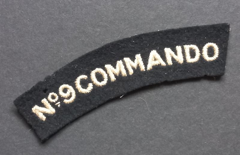 A superb - albeit regrettably single - typical British made Number 9 Commando shoulder title