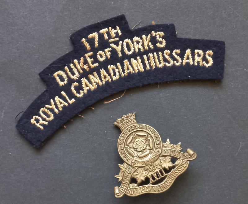 A superb (typical British made) Canadian 17th Duke of York’s Royal Canadian Hussars embroided shoulder title and cap badge