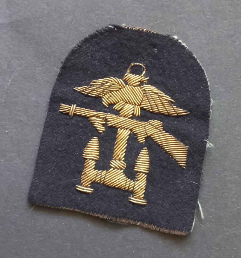 A attractive - albeit regrettably single - British Royal Navy Officer's CO (Combined Operations) - in bullion - formation badge