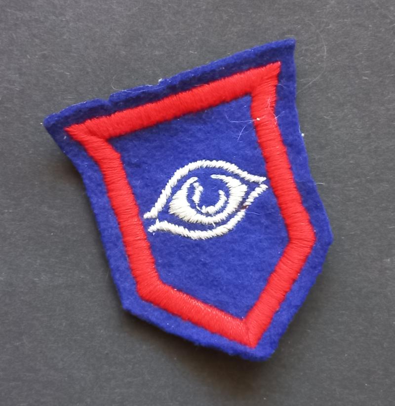 A superb (typical British made with a paste i.e glue backing) Guards Division arm badge