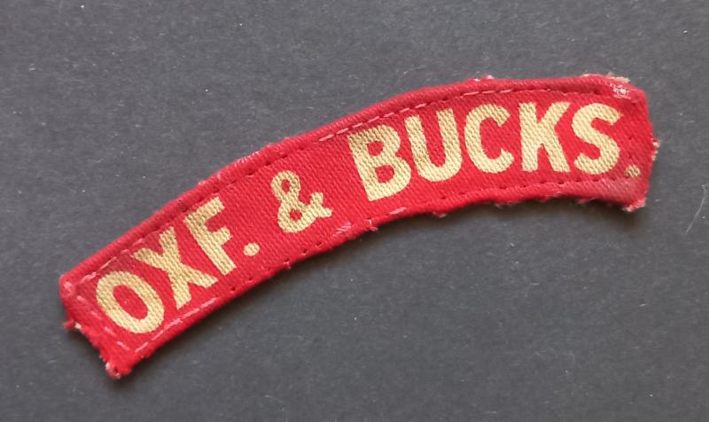 A attractive - albeit regrettably single - issued printed Oxf.& Bucks. (Oxfordshire and Buckinghamshire Light Infantry) shoulder title