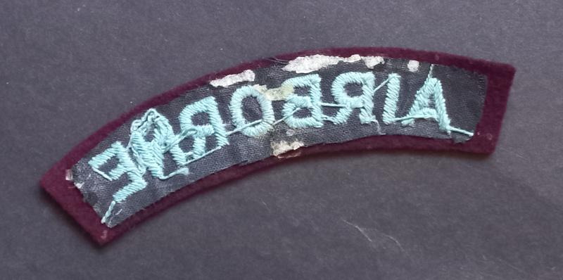 A neat example of a single, but nevertheless difficult to find mid war period curved Airborne shoulder title