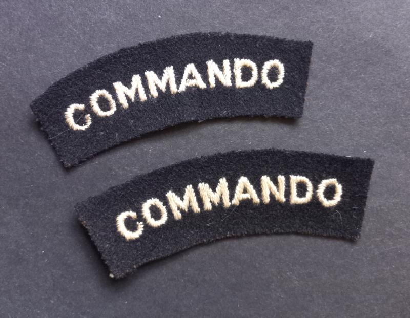 A neat example of a - full matching set -  mid war period so called 'block type' lettering Commando white on black shoulder titles