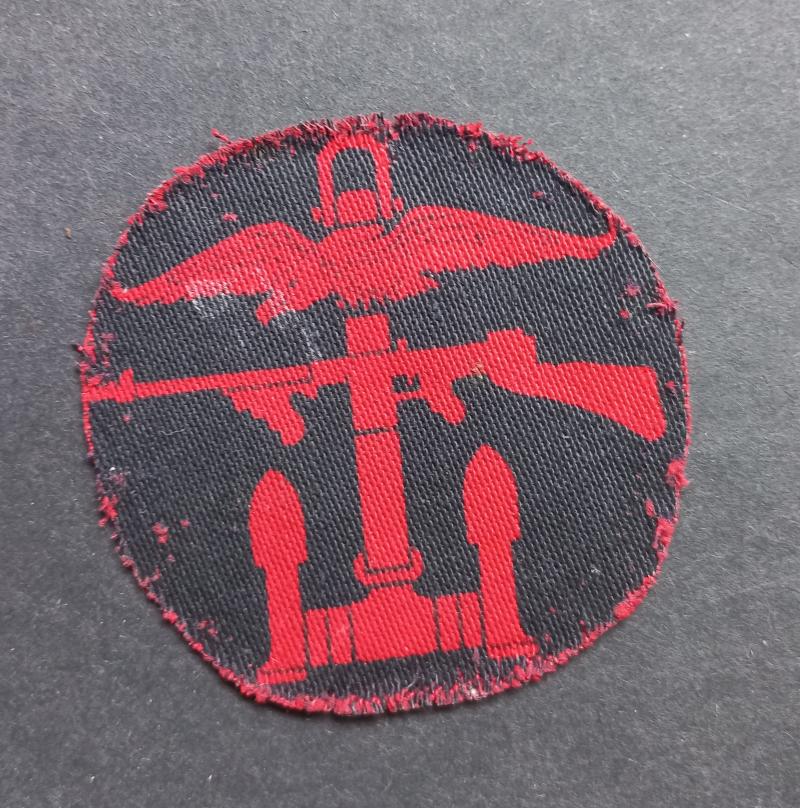 A perfect - left facing  - regrettably single and cut down printed Combines Operation formation badge