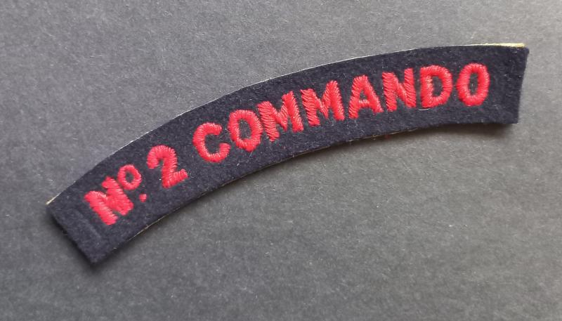 A superb embroided - with white backing - Number 2 Commando shoulder title