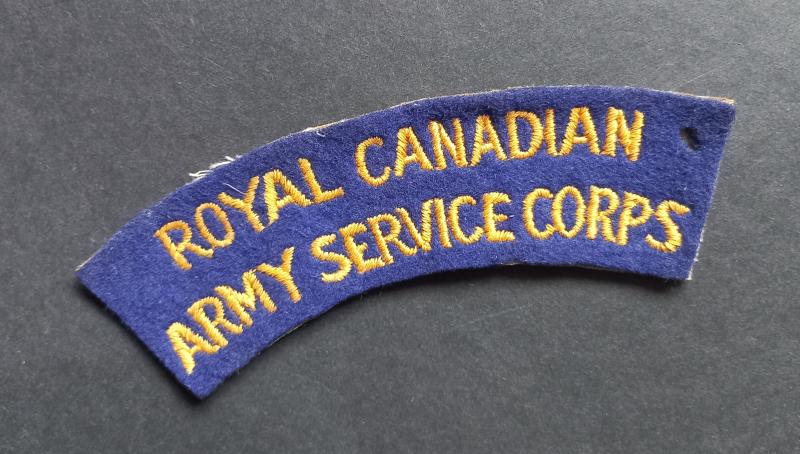 A perfect (typical British made) RCASC (Royal Canadian Army Service Corps) shoulder title