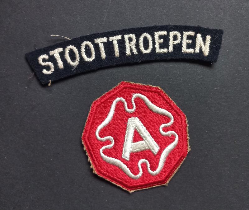 A nice little set of (Dutch and US Army) badges to the Dutch Stoottroepen Regiment and US 9th Army