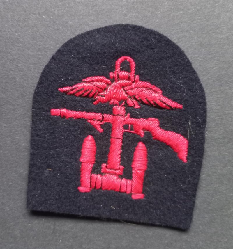 A perfect - left facing - single embroided Combines Operation formation badge