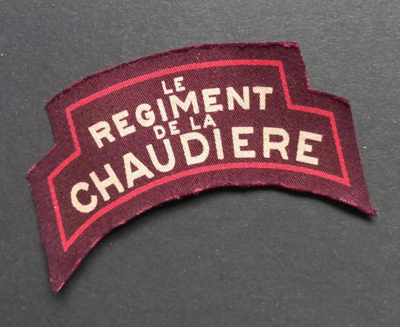 A very attractive and sought after (British made Calico Printers) Canadian Le Regiment de la Chaudiere printed shoulder title