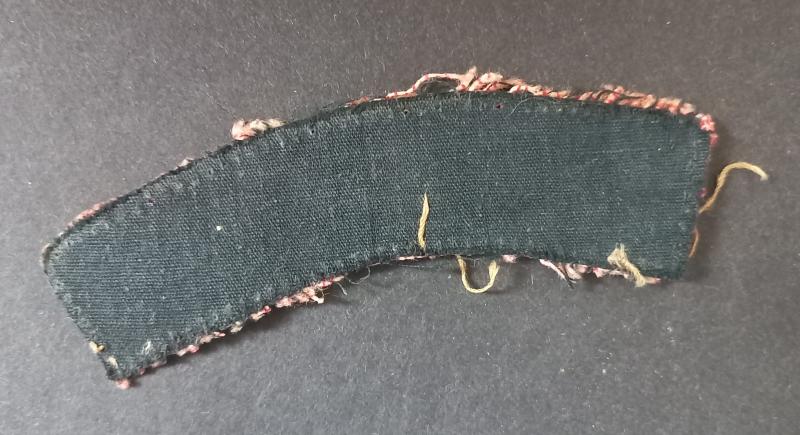 A attractive - albeit regrettably single - issued printed Oxf.& Bucks. (Oxfordshire and Buckinghamshire Light Infantry) shoulder title