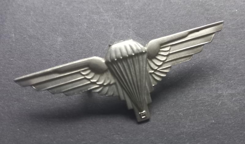 A superb Free French Parachute unit (British cut down badge) beret badge