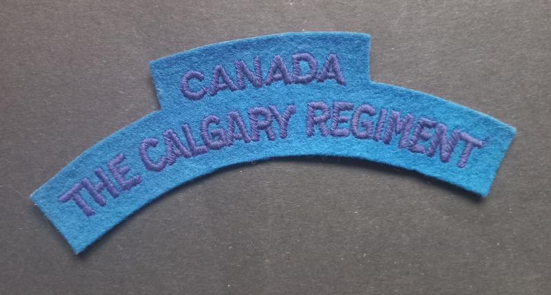 A attractive - British made - Canadian The Calgary Regiment shoulder title