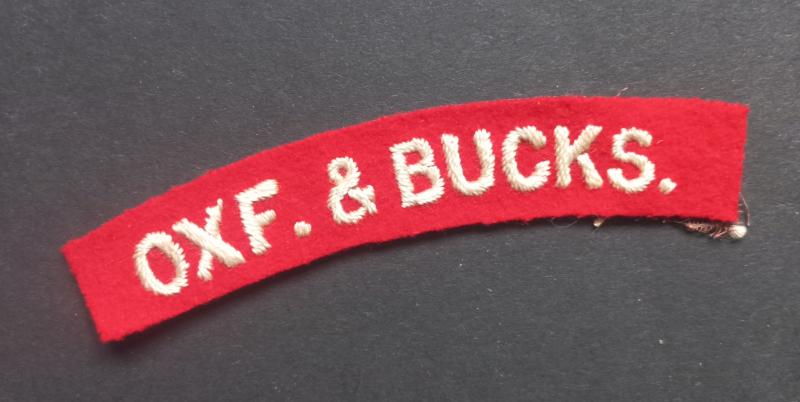 A attractive - albeit regrettably single - un-issued embroided Oxf.& Bucks. (Oxfordshire and Buckinghamshire Light Infantry) shoulder title