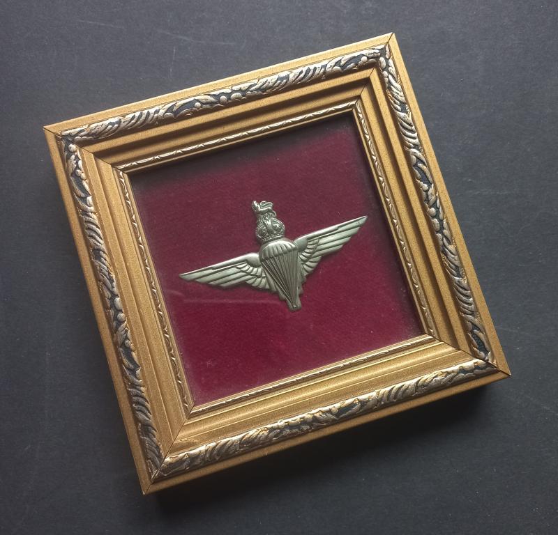 A nicely framed - nickel plated - Parachute Regiment beret badge (unfortunately missing its two brass lugs)