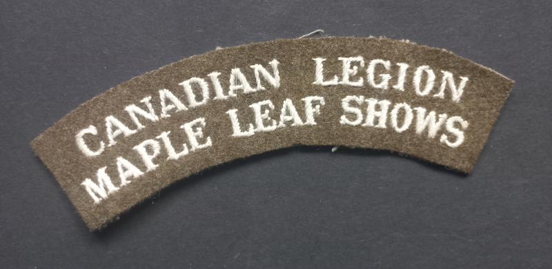 A sought after and difficult to find British made Canadian Legion Maple Leaf Shows shoulder title