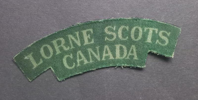A nicely (un-issued printed British made) Canadian Lorne Scots shoulder title