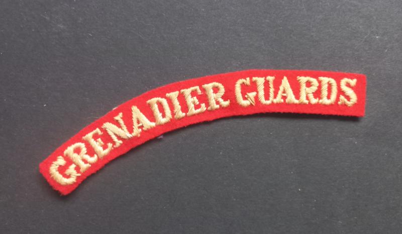 A attractive - late '30s early '40s - Grenadier Guards embroided shoulder title