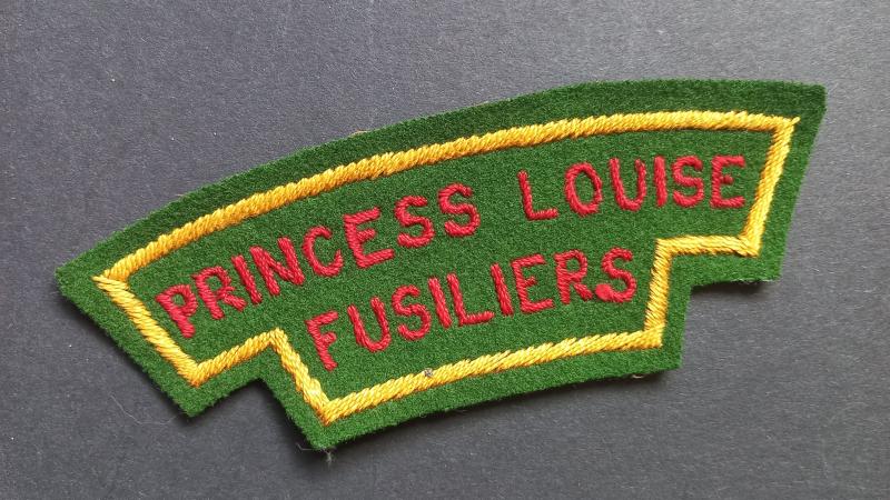 A superb and un-issued (typical British made) Canadian Princess Louise Fusiliers embroided shoulder title
