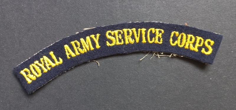 A great and un-issued - albeit regrettably single - so called 'serif' type lettering Royal Army Service Corps shoulder title (attributed to members of the 250 (Airborne) Light Composite Company, RASC)