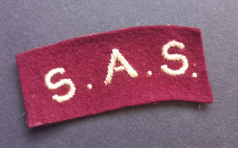 A superb (difficult to find) British made Belgium Special Air Service - albeit regrettably single - shoulder titles
