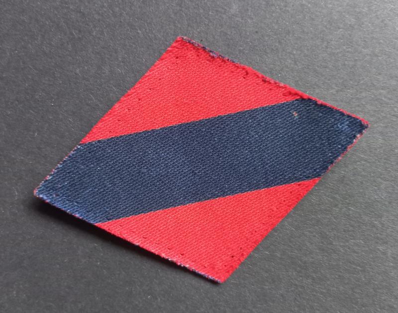 A perfect (uniform removed) British made First Canadian Army (for Headquarters and Miscellaneous) arm badge