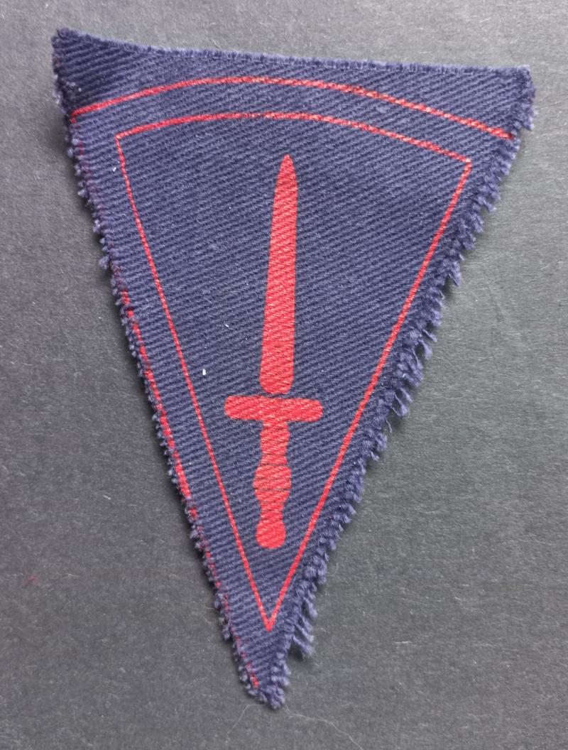 A interesting - late war printed - Commando cloth dagger badge