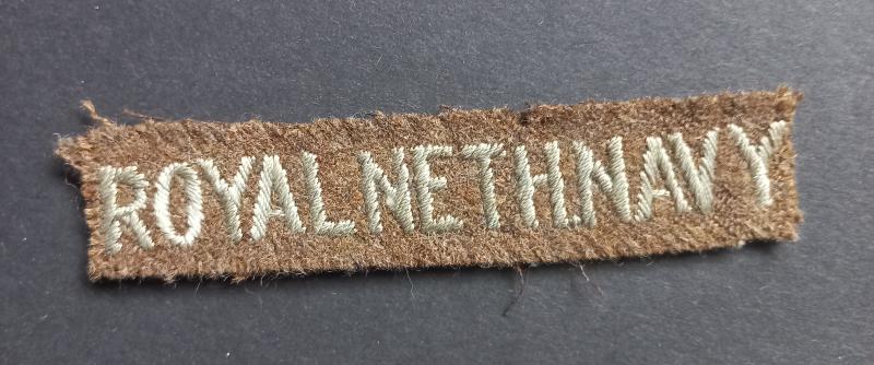 A difficult to find and sought after (British made) Royal Netherlands Navy shoulder title