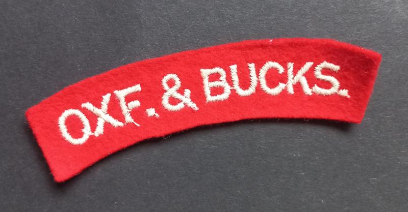 A attractive - albeit regrettably single - issued embroided Oxf.& Bucks. (Oxfordshire and Buckinghamshire Light Infantry) shoulder title