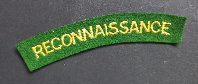 A fine - mid-war period paste backing - un-issued embroided Reconnaissance Corps shoulder title